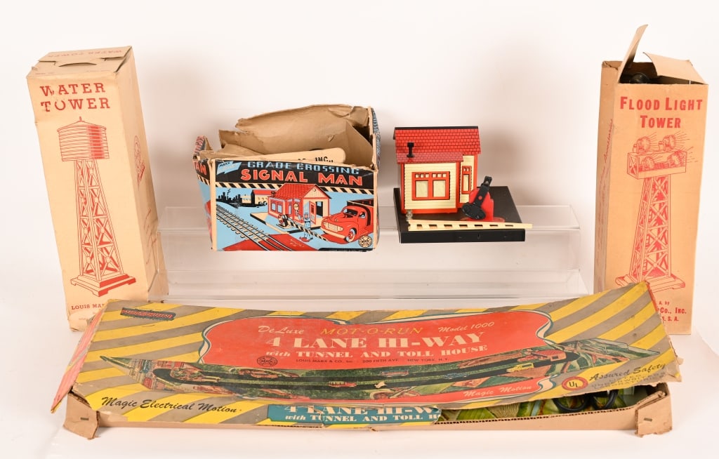 MARX 4-LANE HI-WAY & MORE: includes Marx Electric 4 Lane Hi-Way complete in Box, Marx Signal Man in Box, Marx Water Tower in Box, and Marx Floodlight in Box. All in great shape. Largest 28" Excellent