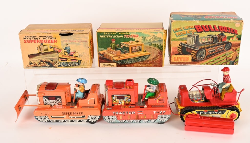 3- JAPAN BATTERY OP BULLDOZERS w/ BOX: Includes Superdozer, Piston Action Dozer, and Mystery Action Dozer. All original in great shape. Boxed. Largest 8" Excellent