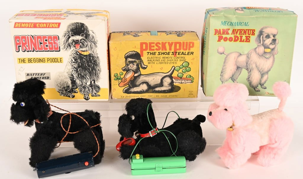 3- JAPAN BATTERY OP DOGS w/ BOX: Includes Princess, Park Avenue Poodle, and Pesky Pup. All original in great shape. Boxed. Largest 9" Excellent