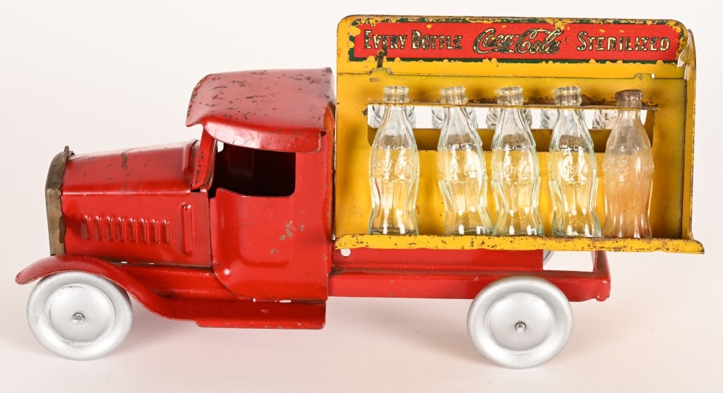 METALCRAFT PRESSED STEEL COCA COLA TRUCK: 1930's Metalcraft Coca Cola truck. The paint is original with the exception of over painted wheels. 11" Very Good-Excellent