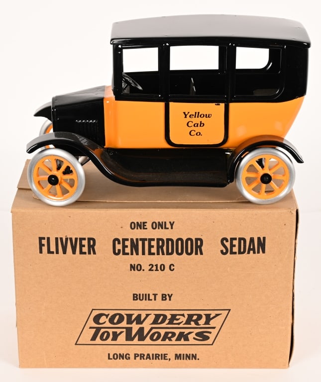 COWDERY CENTER DOOR YELLOW TAXI w/ BOX: Cowdery Center Door Sedan Yellow Taxi. With Cowdery Sticker stamped 153. Boxed. 12" Near Mint