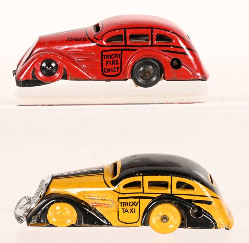MARX TIN WINDUP TRICKY FIRE CHIEF CAR & TAXI (1 of 4)