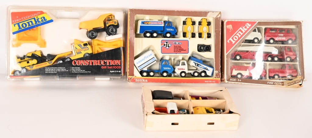 4- TONKA SETS: Includes Tonka #1015 Race Set, #830 Fire Department Set, #1005 Construction Set, and Hot Rods Set. All Boxed 15" Excellent