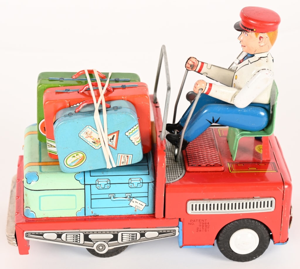 JAPAN BATTERY OP LUGGAGE TRUCK: All original and in great shape. Comes with luggage. Worked when tested. 8" Excellent