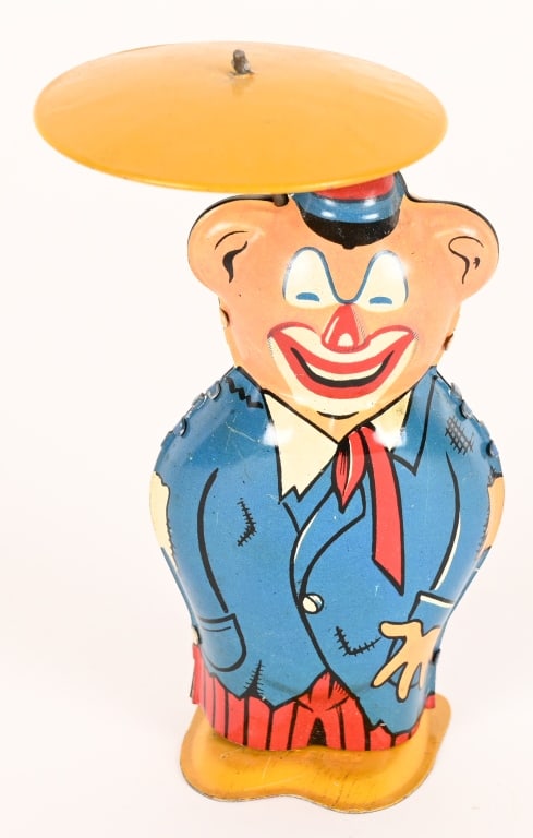 FRANCE TIN WINDUP CLOWN w/ UMBRELLA: All original with nice colors. Works. 6" Excellent