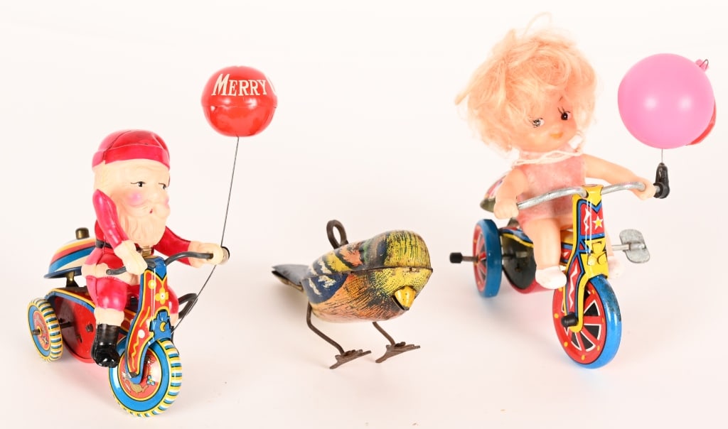 SANTA CLAUS & GIRL WINDUP TRIKES: Both all original and work. Largest 5" Excellent