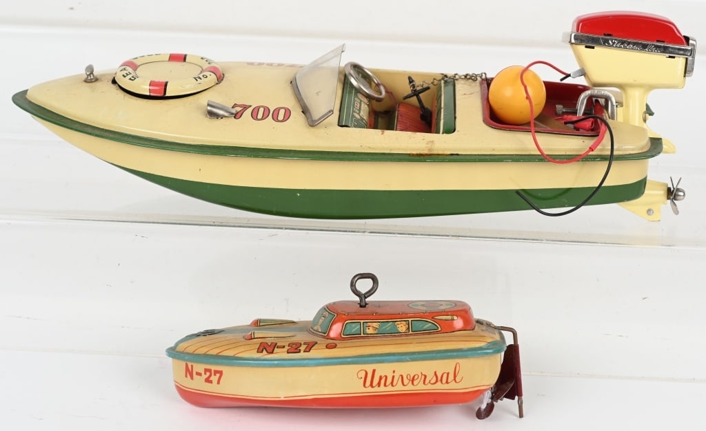2-JAPAN TIN SPEED BOATS: Includes Battery Operated Sea Gull 700 and Tin Windup N-27 Boat. Both all original and in great shape. Largest 12" Excellent