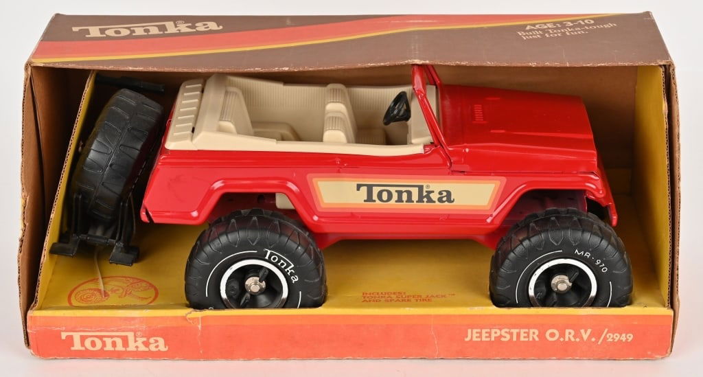 TONKA #2949 JEEPSTER O.V.R. w/ BOX: Tonka #2949 Jeepster O.V.R.. Red with tan interior version. Complete with Spare Tire. Never played with sealed in Box. 17" Near Mint