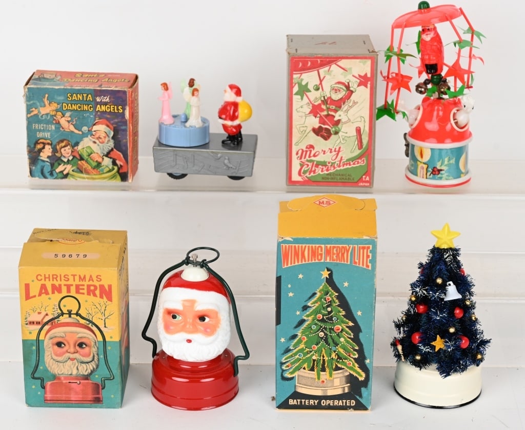 4- JAPAN CHRISTMAS TOYS w/ BOXES: Includes Winking Lite Christmas Tree, Christmas Lantern, Celluloid Merry Christmas, and Santa Dancing Angels. All in great shape and Boxed. Largest 6" Excellent