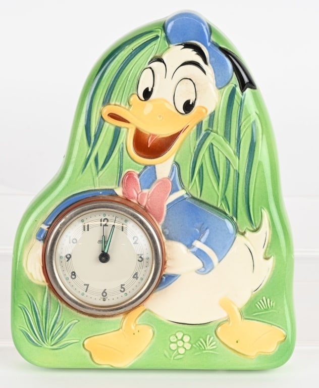 GERMAN WAECHTERSBACH DONALD DUCK CLOCK: Mid century German Waechtersbach Donald Duck clock. Clock is marked Blessing on the dial. The back is porcelain with great colors and details. On the inside of the porcelain it is marked Walt Disney P