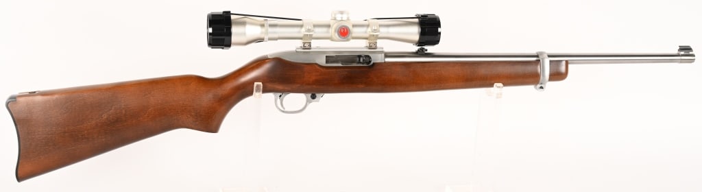 RUGER 10 22 STAINLESS 22 SEMI AUTOMATIC CARBINE: SERIAL NUMBER: 237-99465 BARREL: 18 1/2" CALIBER: 22 LR. MANUFACTURED: 1993 Metal is stainless steel barrel and trigger group. Alloy receiver with Simmons Pro Hunter 4x32 scope. standard front with fo