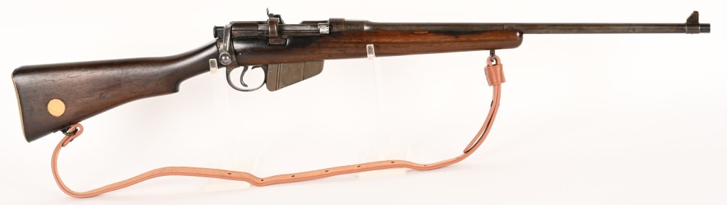 WWII BRITISH SMLE MK III BOLT ACTION 303 SPORTER: SERIAL NUMBER: B8351 BARREL: 21" CALIBER: 303 BRITT. MANUFACTURED: 1915 -1919 Sporterized rifle with patina finish and walnut stock with brass butt plate. ONE 10 round magazine is attached. CONDITION: