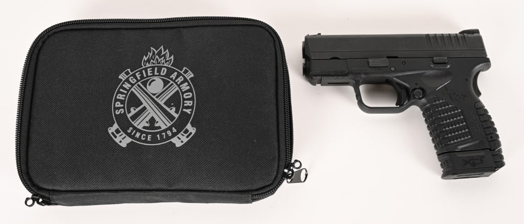 SPRINGFIELD ARMORY XDS SEMI AUTOMATIC 9MM: SERIAL NUMBER: S3747052 BARREL: 3.3" CALIBER: 9 MM (9X19) MANUFACTURED: 2000's Metal is black finish slide with black polymer frame. Fiber optic 3 dot sight system is present. 1 factory magazine and s