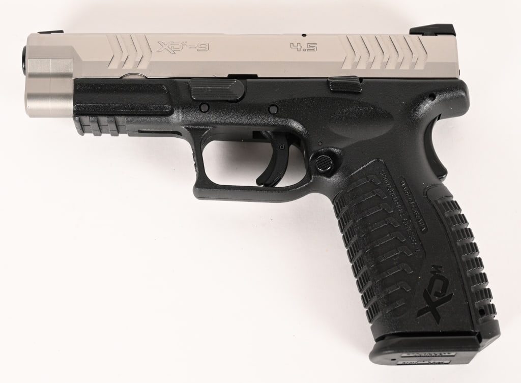 SPRINGFIELD ARMORY XDM-9 SEMI AUTO PISTOL (1 of 4)