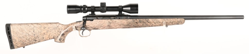 SAVAGE AXIS BOLT ACTION CAMMO RIFLE W/SCOPE: SERIAL NUMBER: K756325. BARREL: 22". CALIBER: 6.5 CREEDMOOR. the Axis features a synthetic all weather stock done up in Mossy Oak camouflage, rubber butt pad, 4 round removeable box magazine, heavy ta