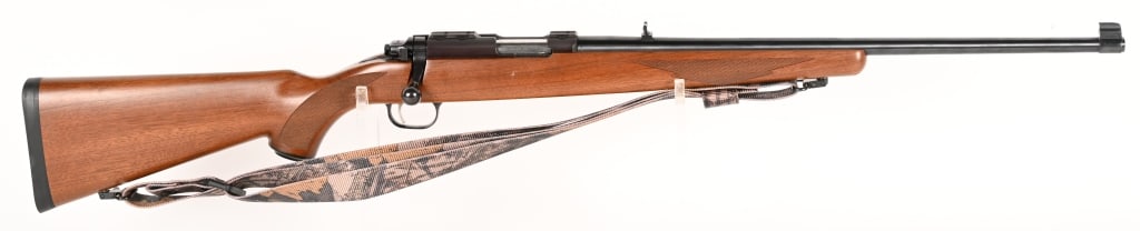 RUGER 77 / 22 BOLT ACTION RIFLE: SERIAL NUMBER: 702-24195. BARREL: 20". CALIBER: 22 LR. MANUFACTURED: 1998. This 77/22 bolt action rifle features a 90 degree bolt throw, solid steel blued receiver, cold hammer forged barrel with fixe