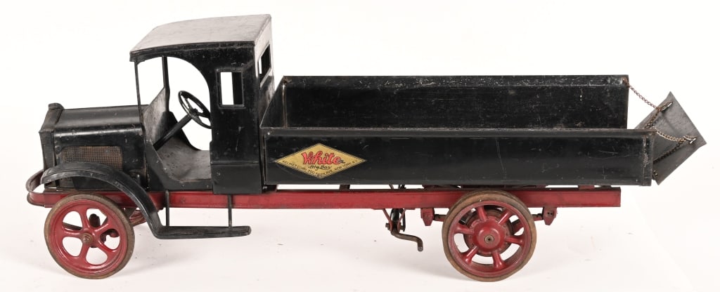 KELMET PRESSED WHITE STEEL DUMP TRUCK: Kelmet pressed steel White "Big Boy" Dump Truck. All original and complete. Very nice condition with good paint and decals. Has typical play patina. Nice early pressed steel truck. 26" Very Good-Excel