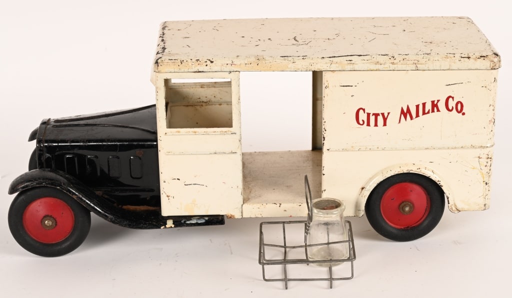STEELCRAFT CITY MILK CO. DELIVERY TRUCK: Steelcraft City Milk Co Delivery Truck. All original with nice paint. Still has Carrier and Bottles. 18" Excellent