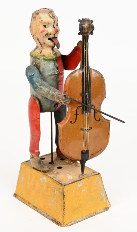 GUNTHERMANN TIN WINDUP BASS PLAYER (1 of 5)