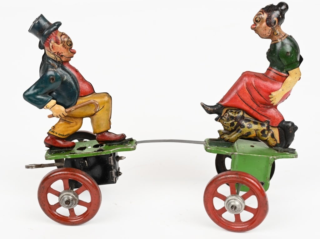 NIFTY TIN WINDUP MAGGIE & JIGGS PLATFORM TOY (1 of 2)