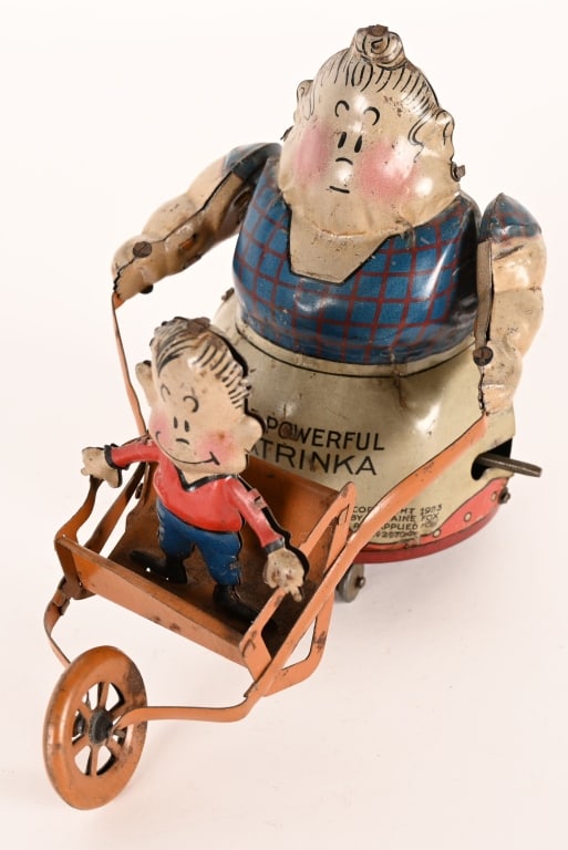 NIFTY TIN WINDUP POWERFUL KATRINKA & JIMMY (1 of 6)