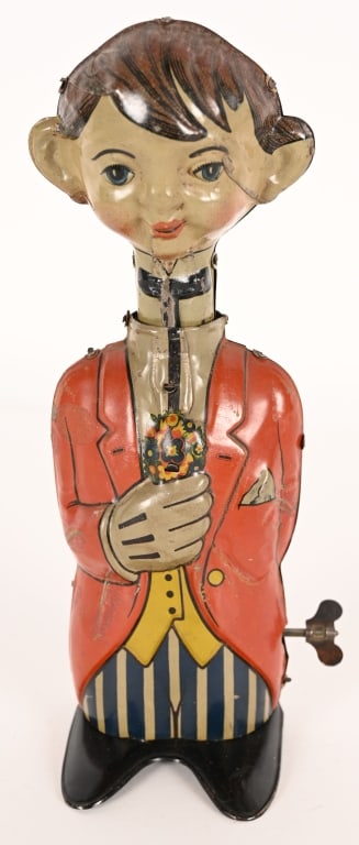 GERMAN TIN WINDUP BOY WITH FLOWERS (1 of 6)