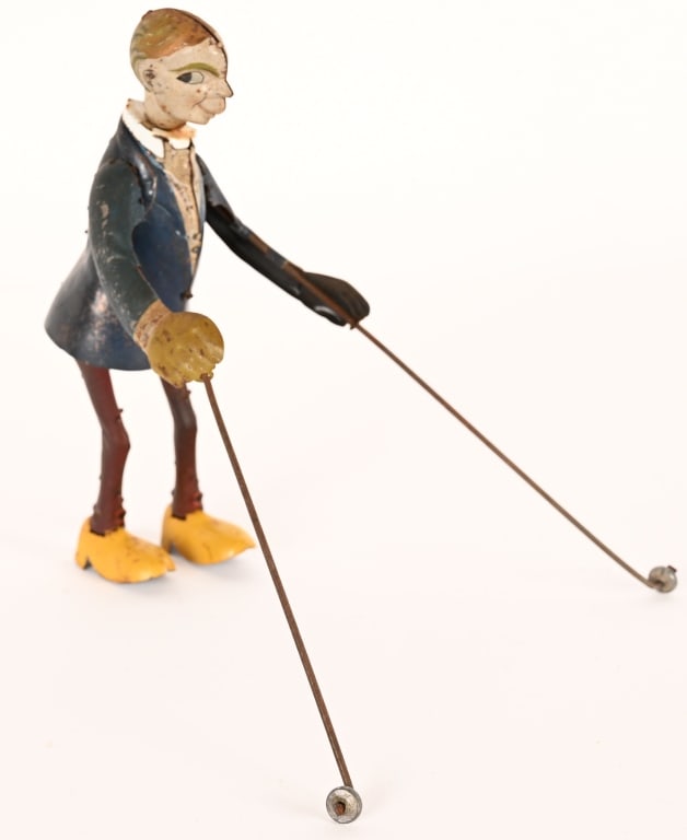 DISTLER TIN WINDUP MAN WALKING WITH POLES (1 of 3)