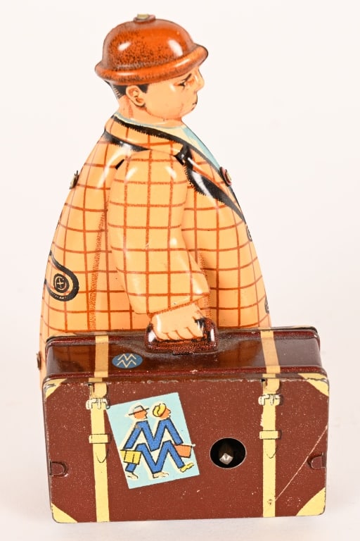 FRITZ VOIT TIN WINDUP MAN WITH SUITCASE (1 of 5)