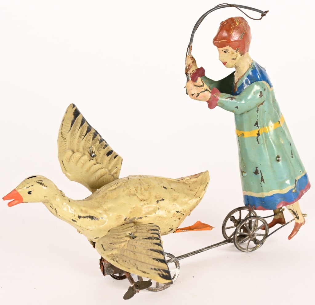 GERMAN HAND PAINTED TIN WINDUP GIRL CHASING GOOSE (1 of 6)