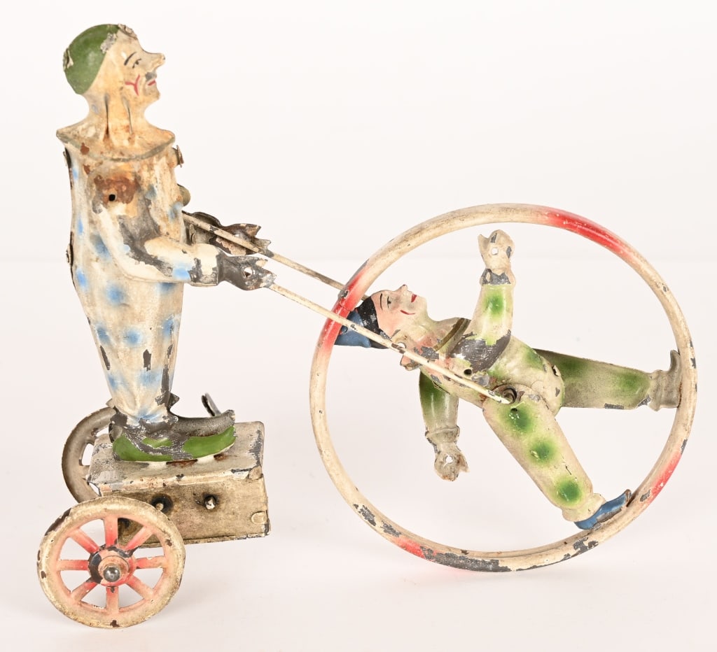 GUNTHERMANN HAND PAINTED TIN CLOWNS IN HOOP (1 of 7)