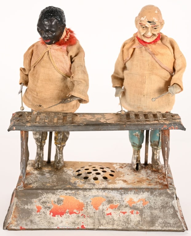 GUNTHERMANN HAND PAINTED TIN XYLOPHONE PLAYERS: German hand painted tin windup Xylophone Players. All original condition except 2 hands. Action works with nice movement and plink plunk sound. 10" Very Good