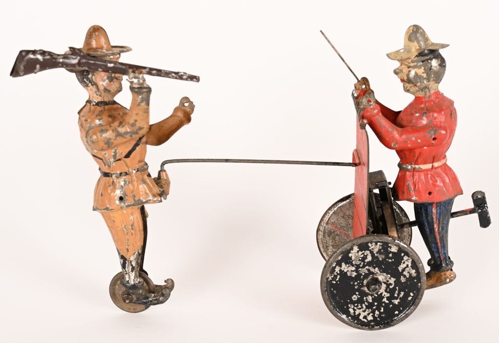 GERMAN HAND PAINTED TIN WINDUP FIGHTING SOLDIERS: German hand painted tin windup Fighting Soldiers. Great design with Soldier with Gun Storming Soldier behind Fort Wall. All original condition. Windup action works. 10" Very Good-Excellent