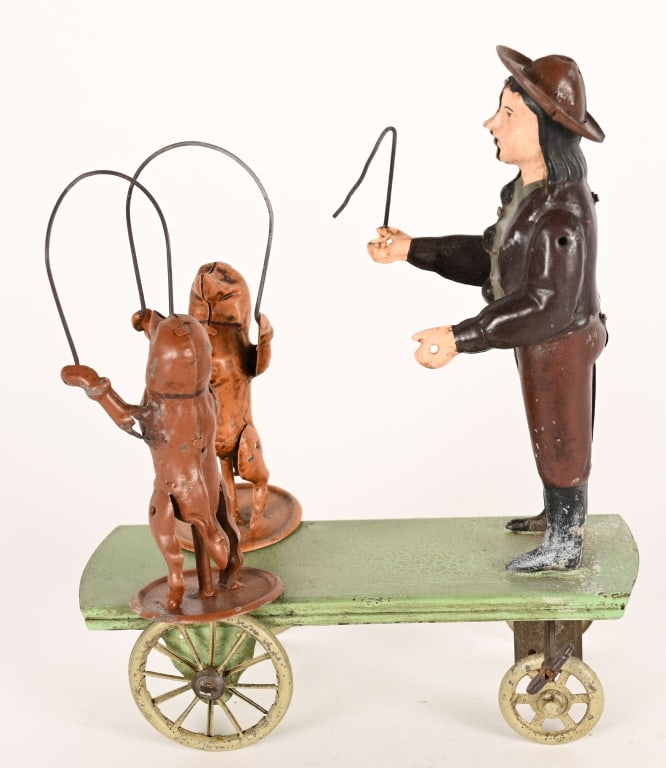 GERMAN HAND PAINTED TIN MAN WITH PERFORMING DOGS (1 of 5)
