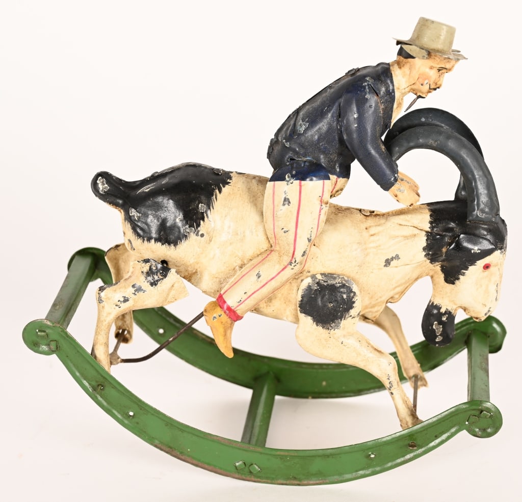 GERMAN HAND PAINTED TIN WINDUP MAN RIDING GOAT (1 of 4)