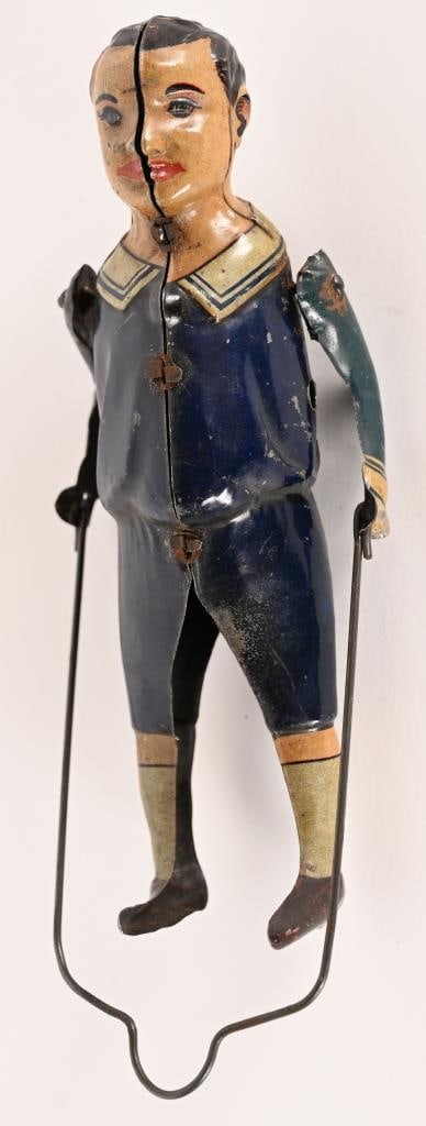 GERMAN TIN WINDUP BOY SKIPPING ROPE (1 of 2)