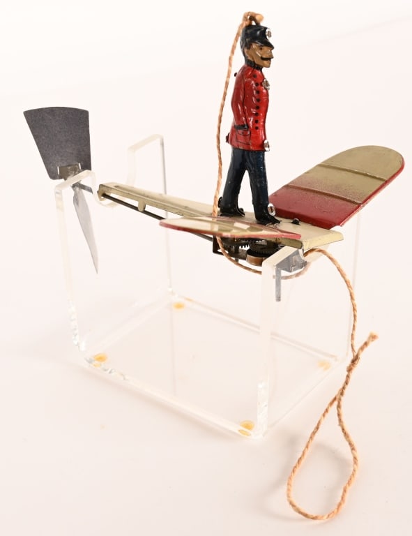 GERMAN TIN WINDUP FLYING FLAPPING WING AIRPLANE: German tin windup Flapping Wing Airplane. All original with Pilot. Windup works. 6" Excellent