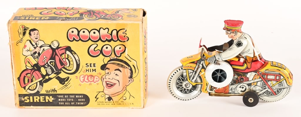 MARX TIN WINDUP ROOKIE COP MOTORCYCLE w/ BOX: Marx tin windup Rookie Cop Motorcycle. Yellow version. Looks never played with condition. Windup works. With Box. 8 1/2" Excellent