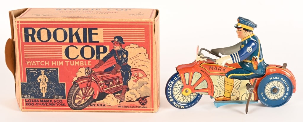 MARX TIN WINDUP ROOKIE COP MOTORCYCLE w/ BOX: Marx tin windup Rookie Cop Motorcycle. Balloon tire version. Looks never played with condition. Windup works. With nice Box. 8 1/2" Excellent