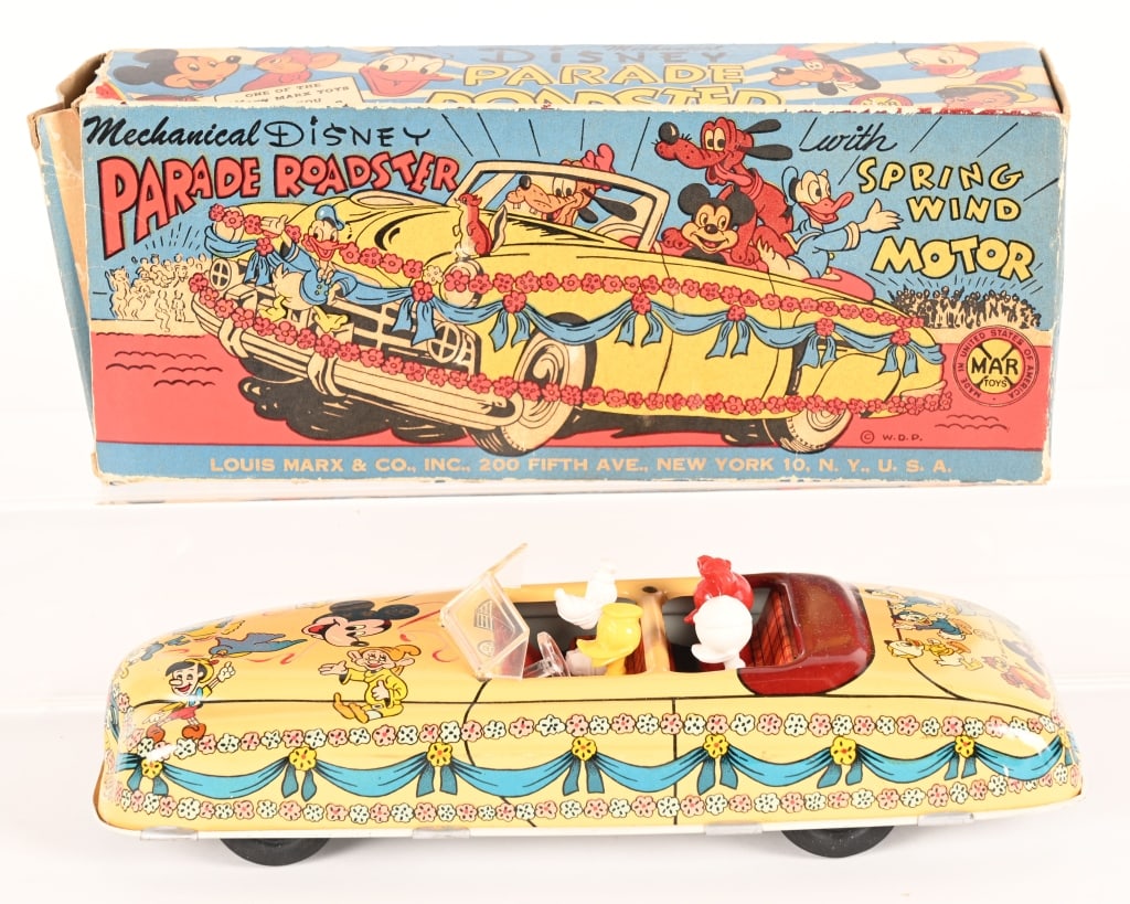 "A CHRISTMAS STORY MOVIE" MARX DISNEY PARADE CAR: Marx tin windup Disney Parade Roadster with Box.. This toy was used in the production of the "A Christmas Story" movie in 1983. These original vintage toys were used in the Higbee Department Store