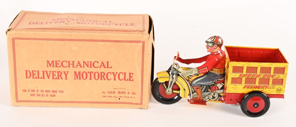 A CHRISTMAS STORY MOVIE MARX DELIVERY MOTORCYCLE: Marx tin windup Delivery Motorcycle with Box. This toy was used in the production of the "A Christmas Story" movie in 1983. These original vintage toys were used in the Higbee Department Store scenes