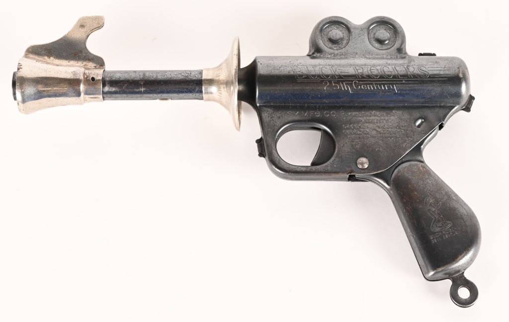 A CHRISTMAS STORY MOVIE DAISY BUCK ROGERS PISTOL: Daisy Buck Rogers Atomic Pistol.. This toy was used in the production of the "A Christmas Story" movie in 1983. These original vintage toys were used in the Higbee Department Store scenes and