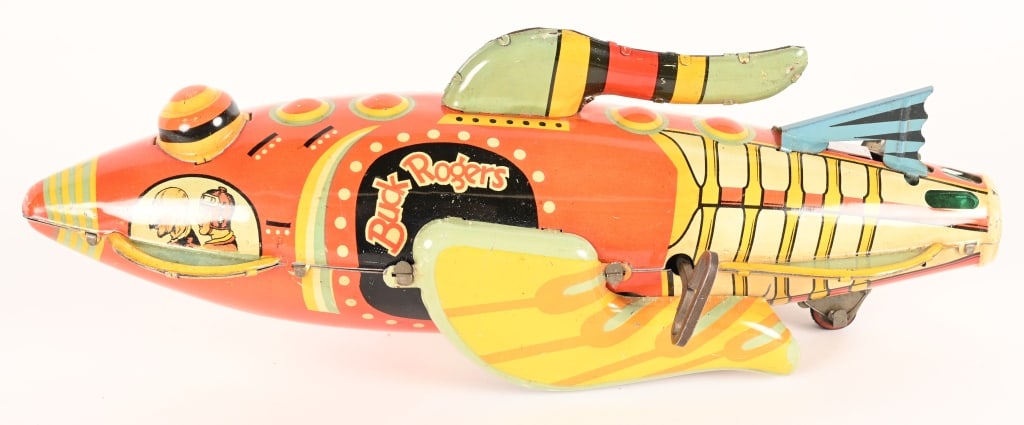 "A CHRISTMAS STORY MOVIE" MARX BUCK ROGERS ROCKET: Marx tin windup Buck Roger Rocket.. This toy was used in the production of the "A Christmas Story" movie in 1983. These original vintage toys were used in the Higbee Department Store scenes and Christ