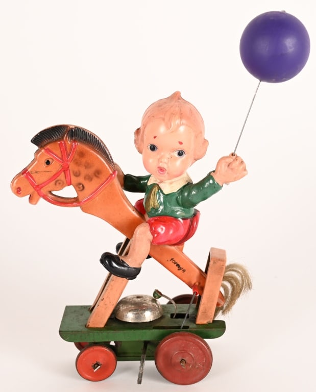 PRE-WAR JAPAN CELLULOID WINDUP BOY ON HOBBY HORSE (1 of 5)