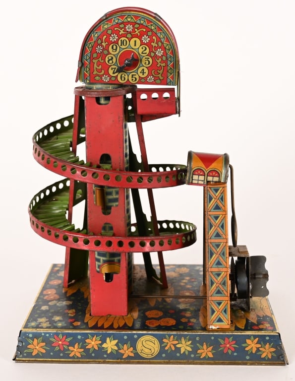 PRE-WAR JAPAN TIN WINDUP SPIRAL BALL TOY: Pre-War Japan tin windup Spiral Ball Toy. All original with wonderful colors and graphics. Has clock in top of spiral. Windup works. A rare and wonderful toy. 9" Excellent