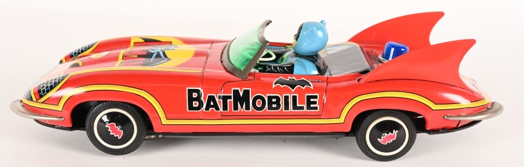 AOSHIN SHOTEN BATTERY OP BATMOBILE: Japan battery operated Batmobile. Large red version. All original with great colors and graphics. Has wonderful full body Batman driver. Battery box is clean. Worked when tested. A very hard to find B