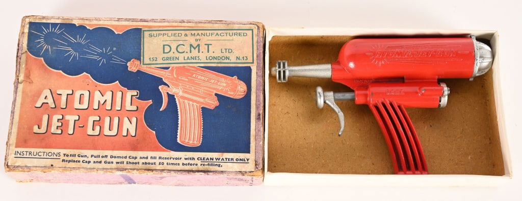 CRESCENT ATOMIC JET GUN w/ BOX: English diecast Atomic Jet Gun. Red painted version. All original and in exceptional condition. Boxed 6" Excellent