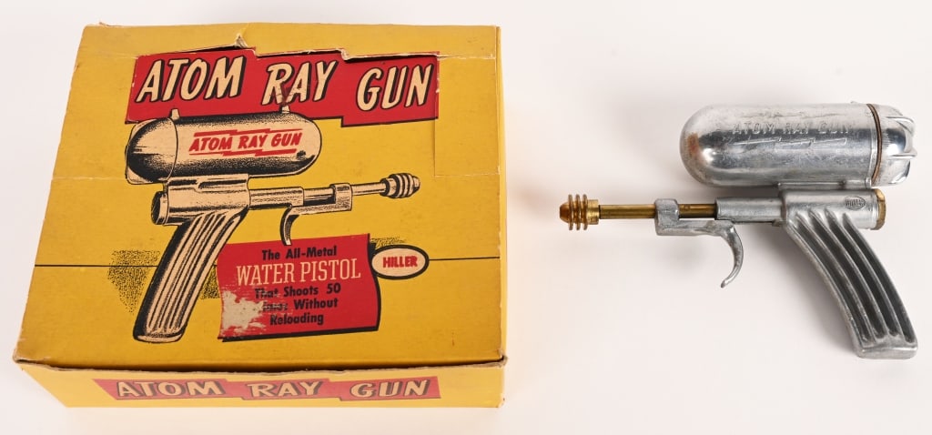 HILLER ATOM RAY GUN w/ BOX: Hiller Atom Ray Gun. All original and never played with condition. Great design. Boxed with Insert. 7" Excellent