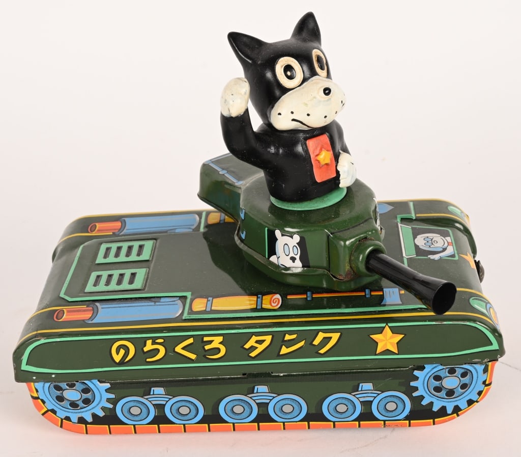 MT TIN FRICTION NORAKURO TANK: Japan tin friction Norakuro Tank. Great Japanese Character toy. All original with vinyl Norakuro figure in tin Tank. Friction works. 8" Excellent