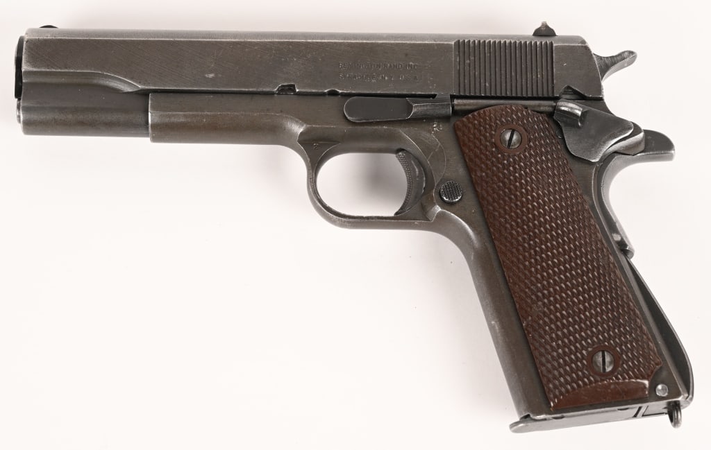 WW2 ERA REMINGTON RAND 1911 A1 MFG 1944 .45 ACP: SERIAL NUMBER: 1983972 BARREL: 5" CALIBER: .45 ACP MANUFACTURED: 1944 Made in the USA. Metal is mat finished steel with standard sights. F. P. marked barrel ( Flannery Bolt Co.). Remington two line