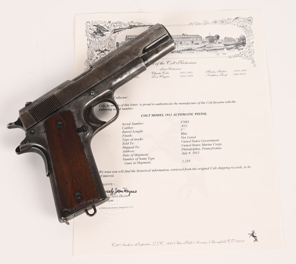 WW1 ERA U.S.M.C. COLT 1911 MADE 1913 WITH LETTER: SERIAL NUMBER: 37095 BARREL: 5" CALIBER: 45 ACP. MANUFACTURED: 1913 Shipped to the Marine Corps on July 9th 1913. Metal is blue finished with standard sights. Colt barrel with correct parts through